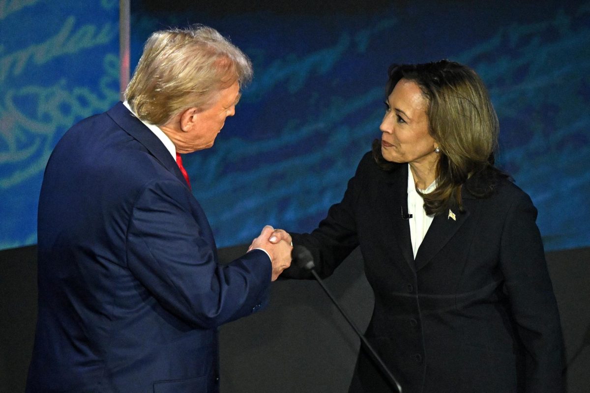 Former president Donald Trump and Vice President Kamala Harris shake hands at their debate.